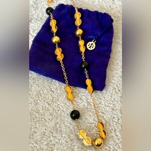 Elegant Gold and Black Necklace